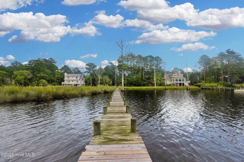 Waterfront homesite with extensive dock frontage in the gated - photo 6