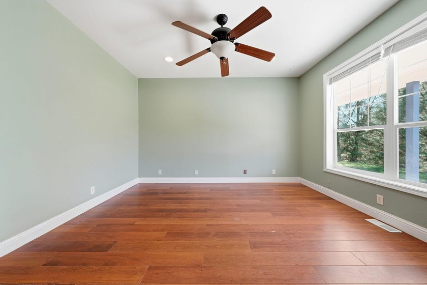 Gorgeous custom farmhouse situated on 5 acres, offering 3 - photo 31