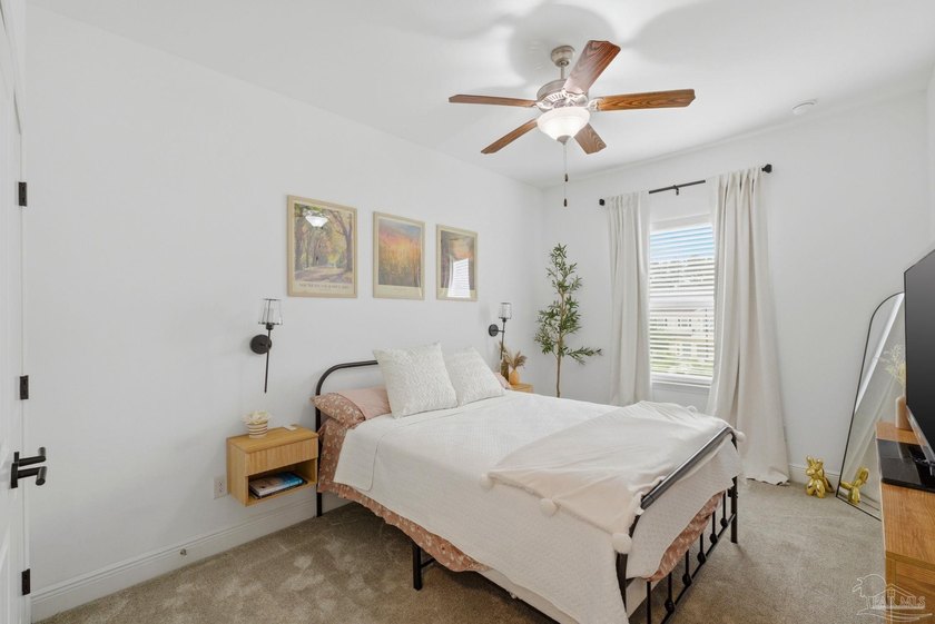Welcome home to this beautiful end unit townhome in the gated - photo 22