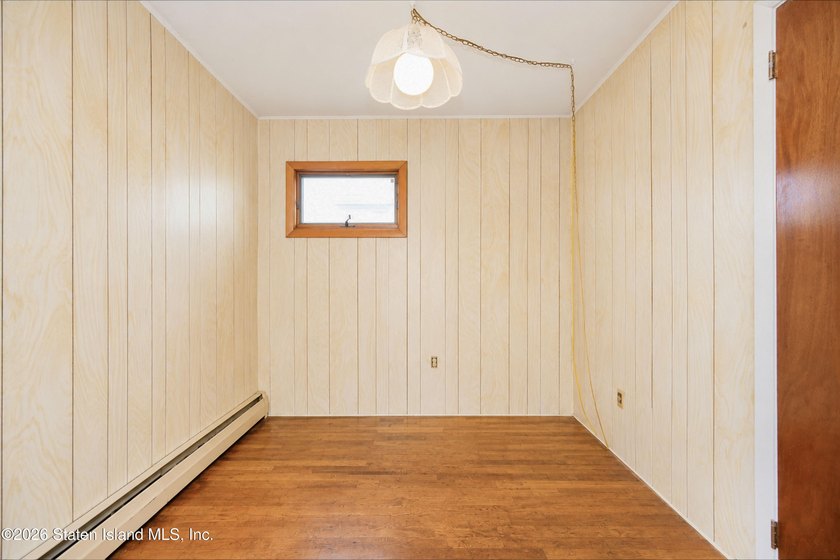 A charming 4-bedroom, 1-bath Cape Cod in Willowbrook, this home - photo 14