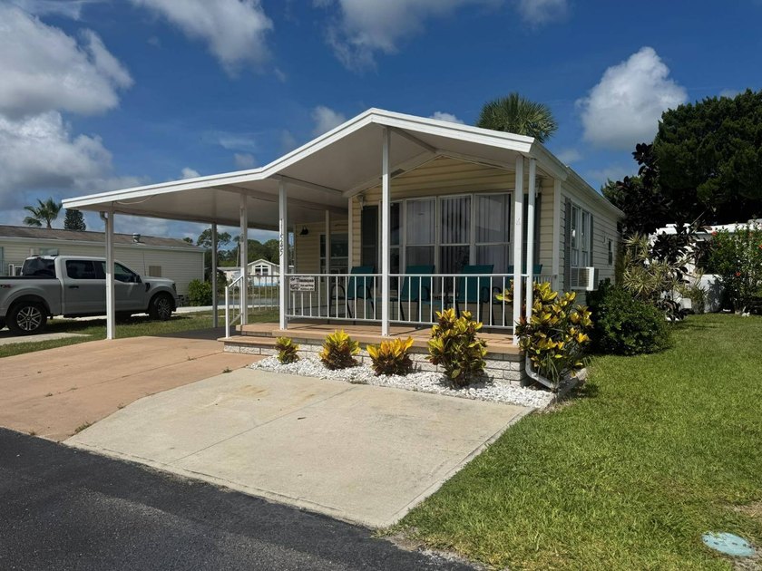 PARADISE AT YOUR FINGERTIPS! This AFFORDABLE home is in the LOW - photo 4