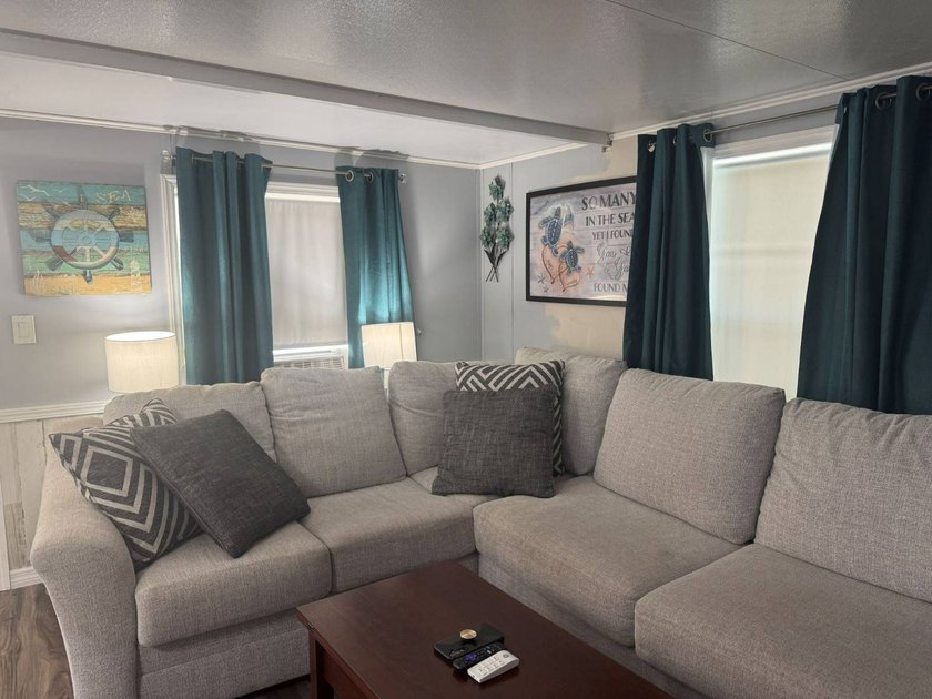 PARADISE AT YOUR FINGERTIPS! This AFFORDABLE home is in the LOW - photo 8