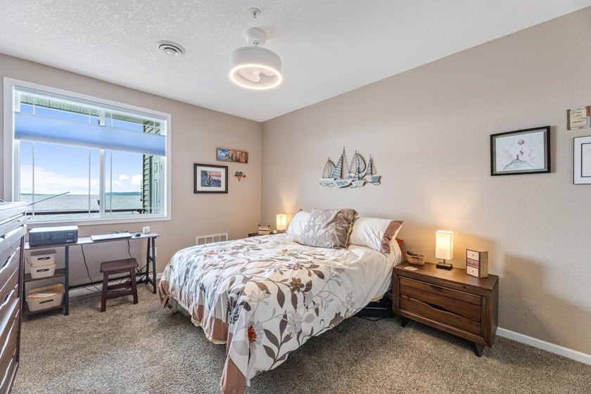 --Enjoy breathtaking views of this rare waterfront lake and - photo 13