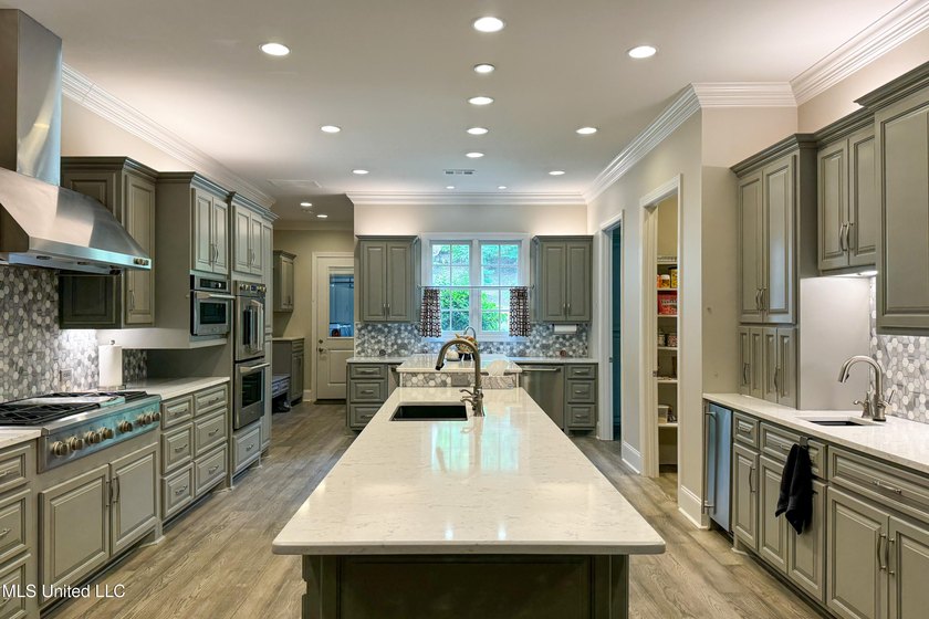 Discover this exceptional residence in The Highlands, a premier - photo 10