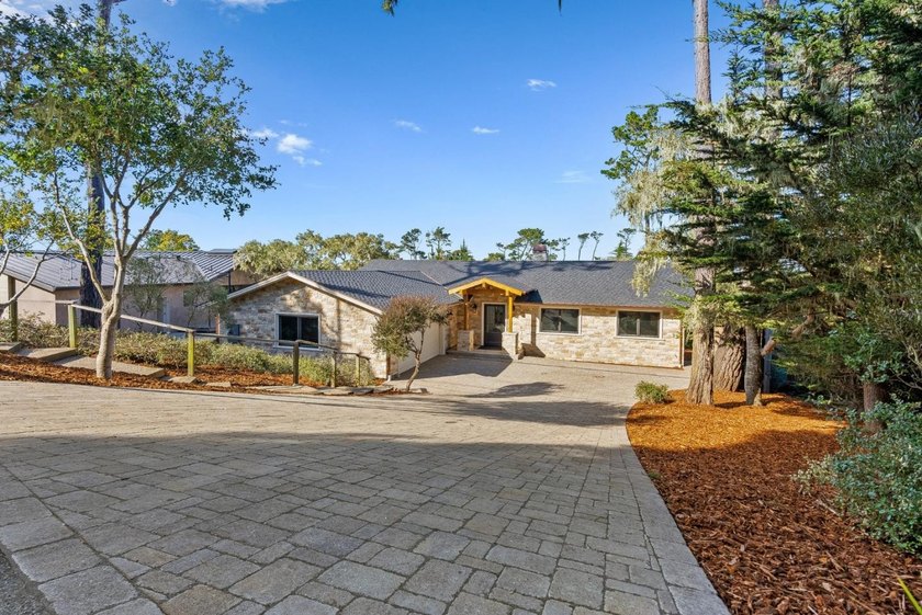 Nestled in the heart of Pebble Beach and surrounded by the - photo 2