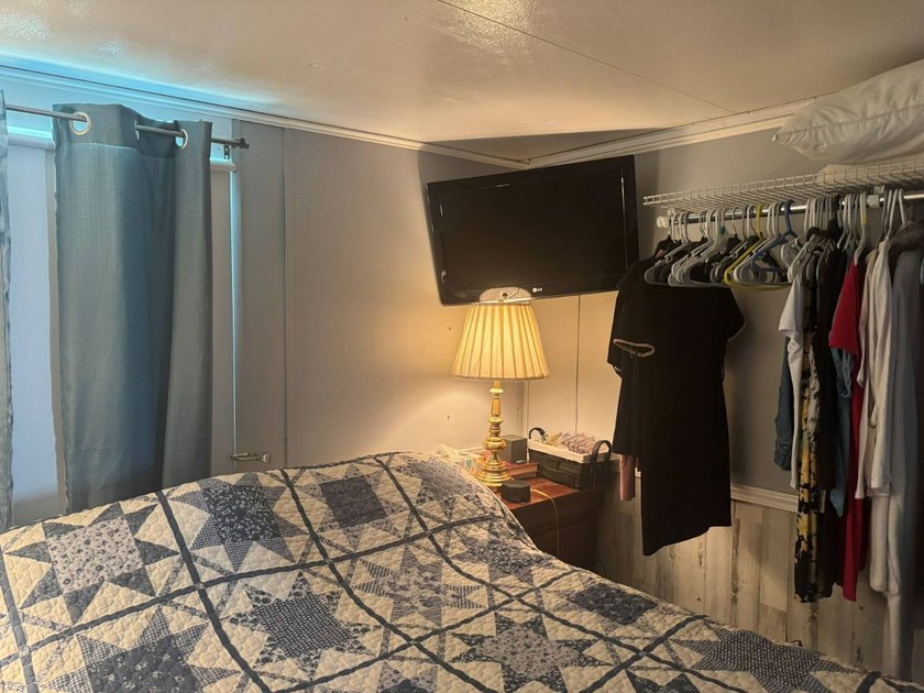 PARADISE AT YOUR FINGERTIPS! This AFFORDABLE home is in the LOW - photo 13