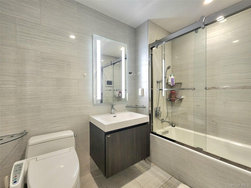 Welcome to Unit 16J at Skyview's Grand One Tower! This rare - photo 16