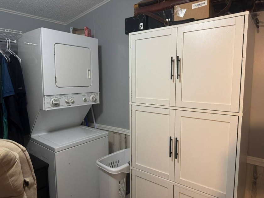 PARADISE AT YOUR FINGERTIPS! This AFFORDABLE home is in the LOW - photo 18