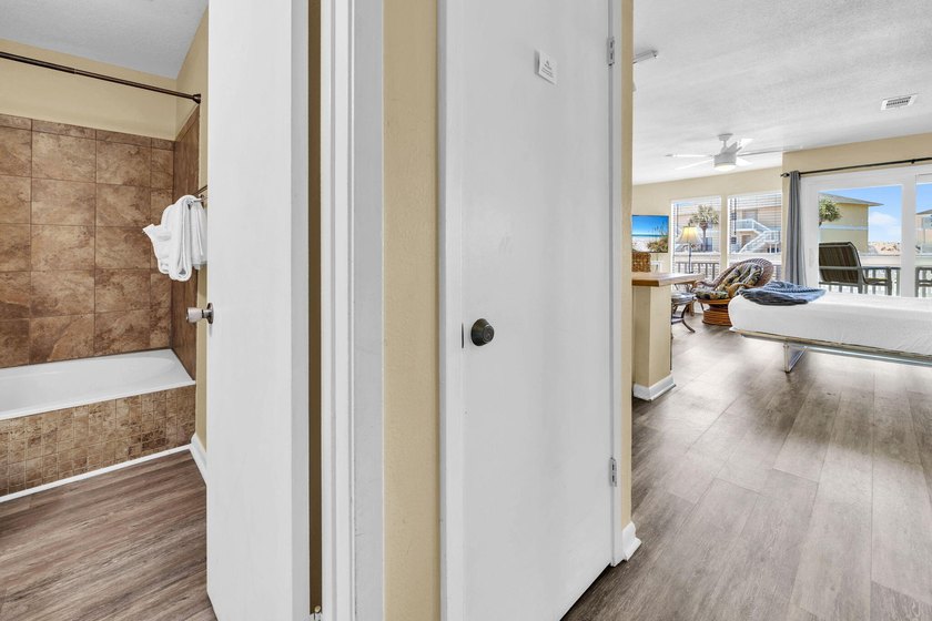 Direct beach access is the standout at Sandpiper Cove, a gated - photo 18