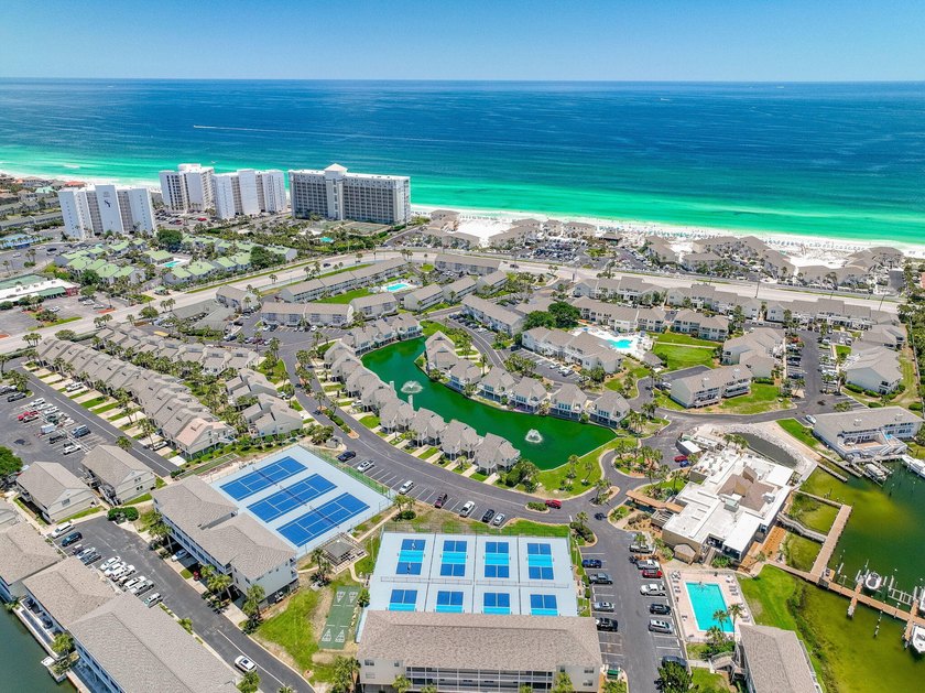 Direct beach access is the standout at Sandpiper Cove, a gated - photo 47