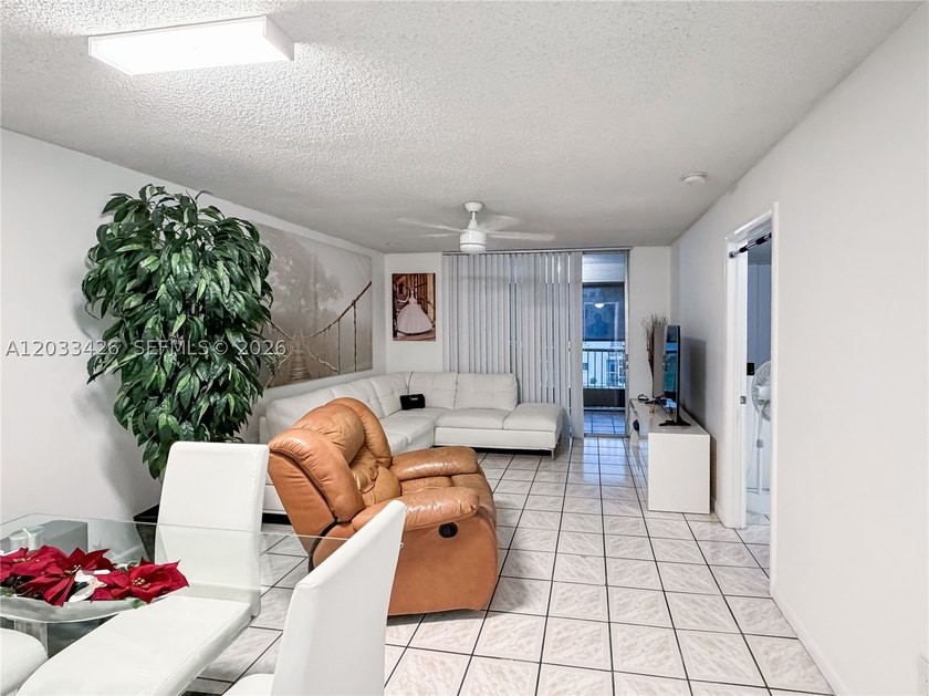 Well-maintained and spacious 2-bedroom, 2-bathroom condo located - photo 9