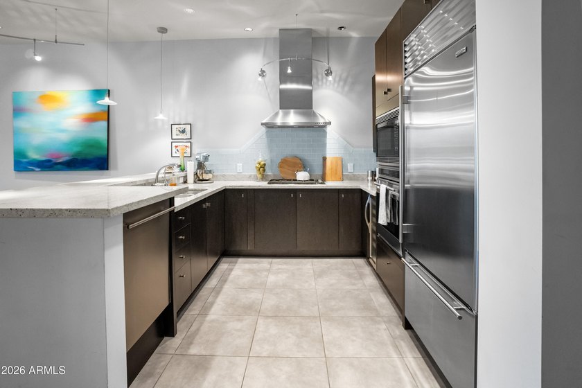 Welcome home to this amazingly beautiful end, ground-floor unit - photo 13