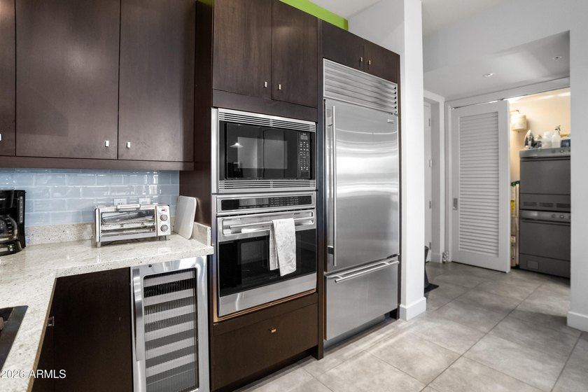 Welcome home to this amazingly beautiful end, ground-floor unit - photo 15