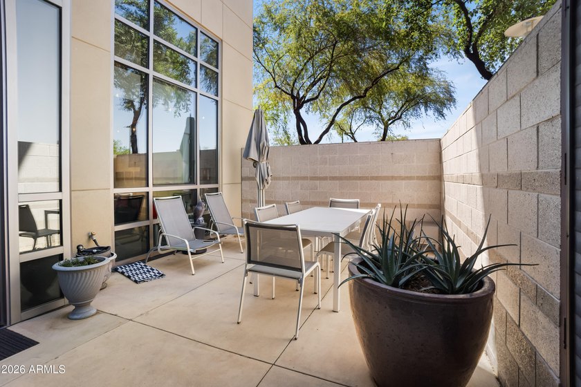 Welcome home to this amazingly beautiful end, ground-floor unit - photo 20