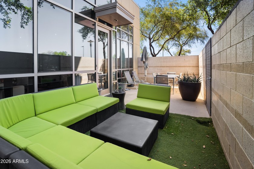 Welcome home to this amazingly beautiful end, ground-floor unit - photo 21