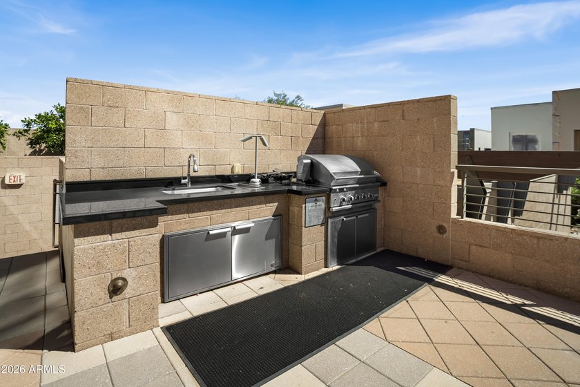 Welcome home to this amazingly beautiful end, ground-floor unit - photo 33