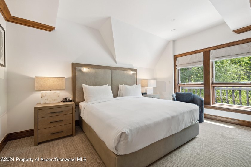 The Aspen Mountain Residences is nestled at the base of the - photo 15
