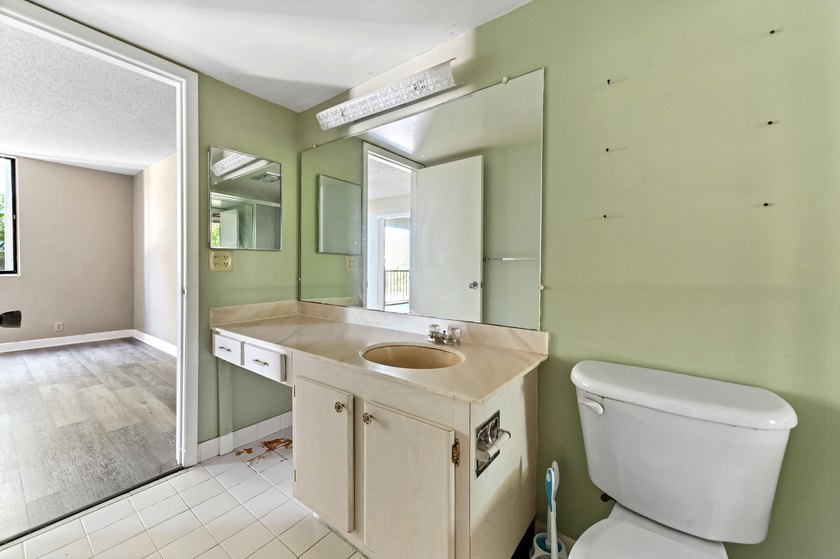 This beautiful condo presents an incredible opportunity for a - photo 18