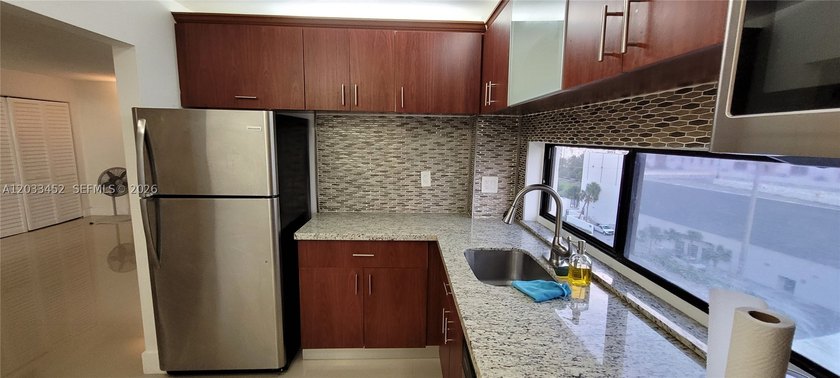 Nice completely remodeled unit with permits. Good for an - photo 2