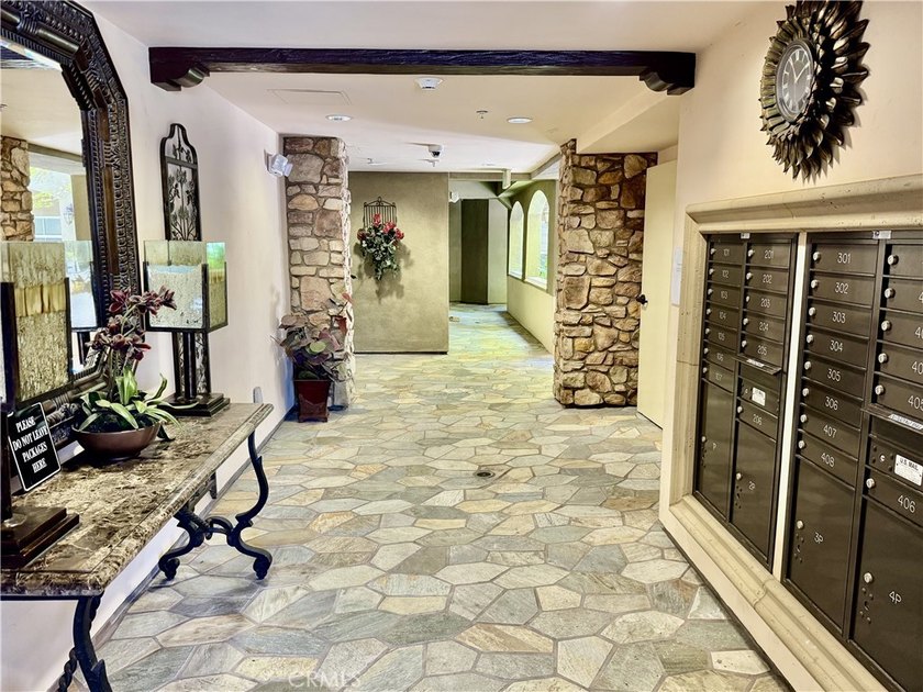 Welcome to this spacious and beautifully updated three-bedroom - photo 10