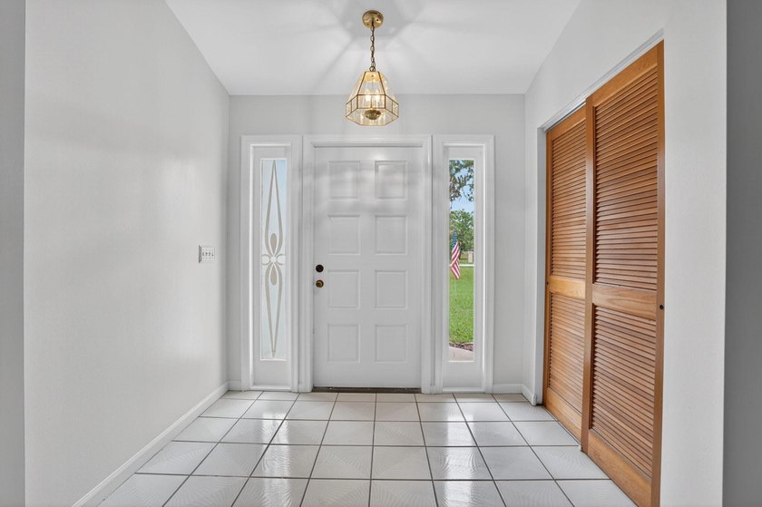 Enjoy peaceful country living in Jupiter Farms with this - photo 4