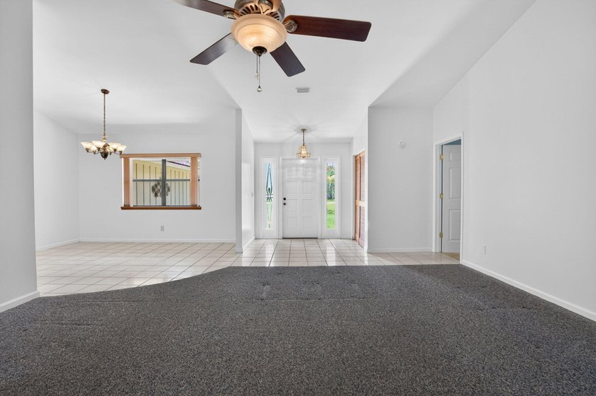 Enjoy peaceful country living in Jupiter Farms with this - photo 5