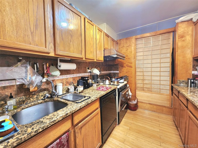 Welcome to unit 1K at 143-07 Sanford Avenue, a well-maintained - photo 12