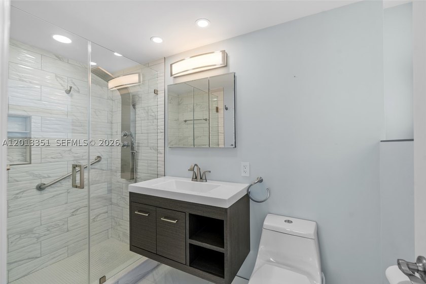 Fully renovated and thoughtfully reimagined, this east-facing - photo 13