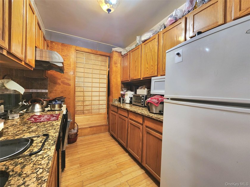 Welcome to unit 1K at 143-07 Sanford Avenue, a well-maintained - photo 14