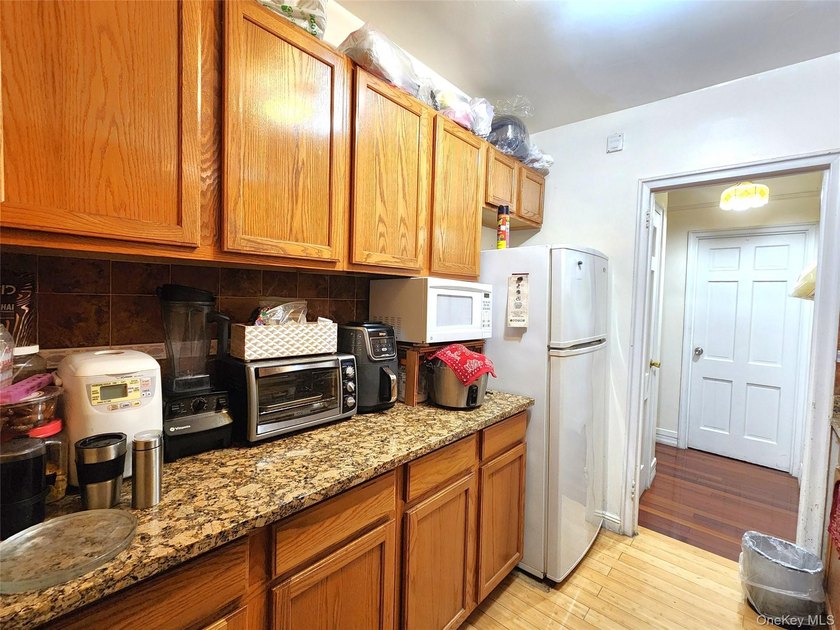 Welcome to unit 1K at 143-07 Sanford Avenue, a well-maintained - photo 15