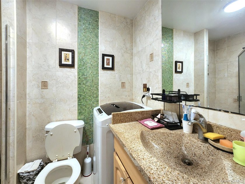 Welcome to unit 1K at 143-07 Sanford Avenue, a well-maintained - photo 23