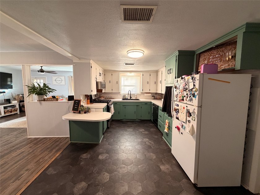 Updated home for the family with additional living area added to - photo 16
