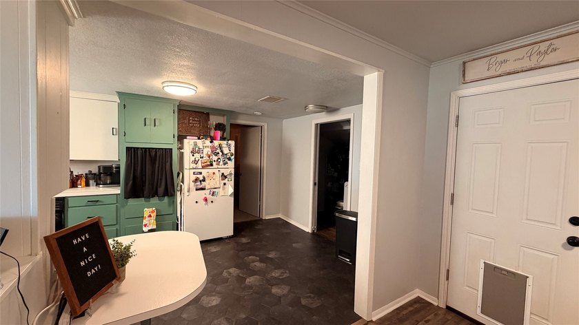 Updated home for the family with additional living area added to - photo 17