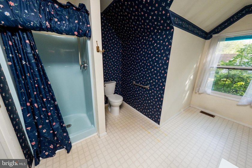 Spacious and inviting, this oversized Cape Cod offers 1900 - photo 21