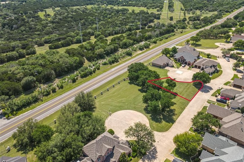 Nestled on a quiet street within the prestigious gated Bluff - photo 19