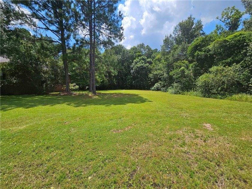 Beautiful Level and mostly Cleared Lot in a well established - photo 3