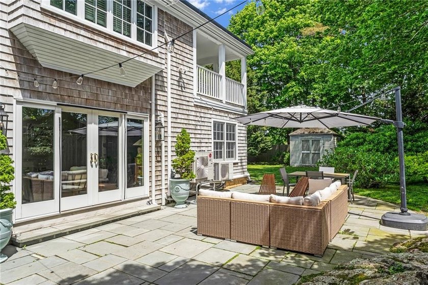 A gracious residence tucked along a picturesque street just off - photo 17