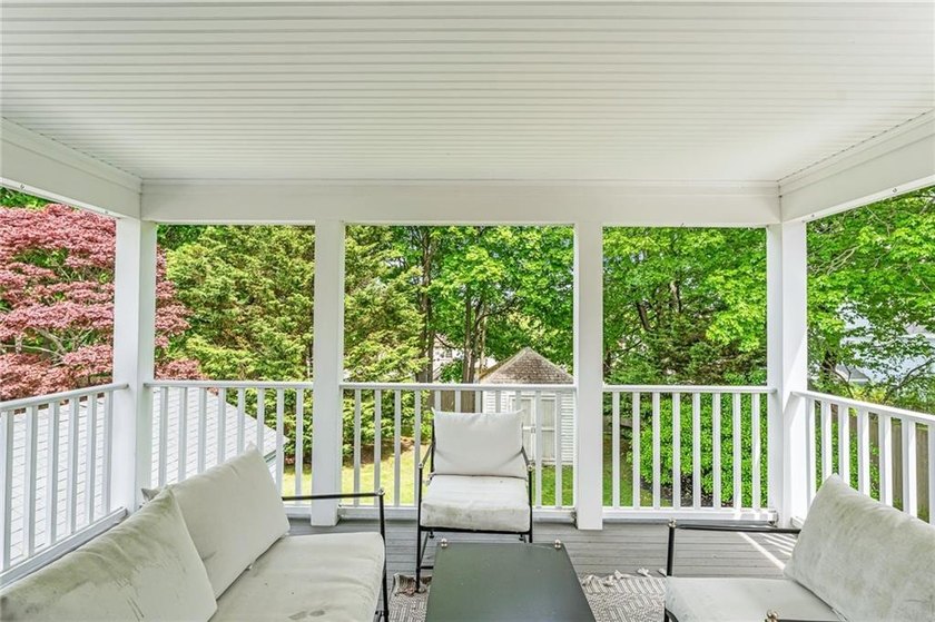 A gracious residence tucked along a picturesque street just off - photo 25