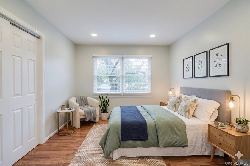Nestled on a quiet, tree-lined cul-de-sac in Northport, this - photo 11