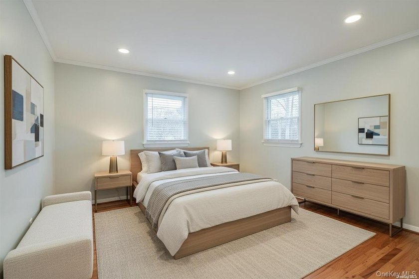 Nestled on a quiet, tree-lined cul-de-sac in Northport, this - photo 13