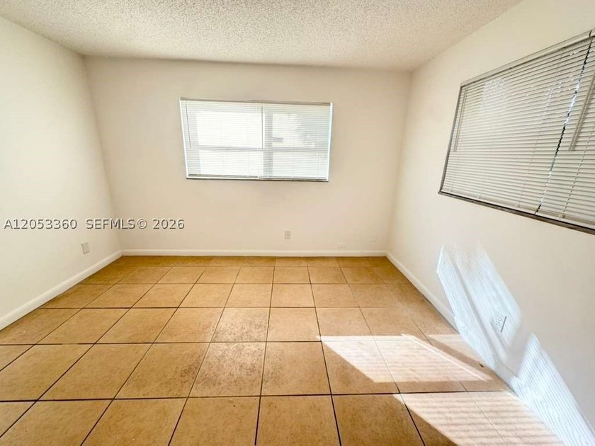 Very nice 2 bedroom/2 bathroom first floor corner unit tile - photo 15
