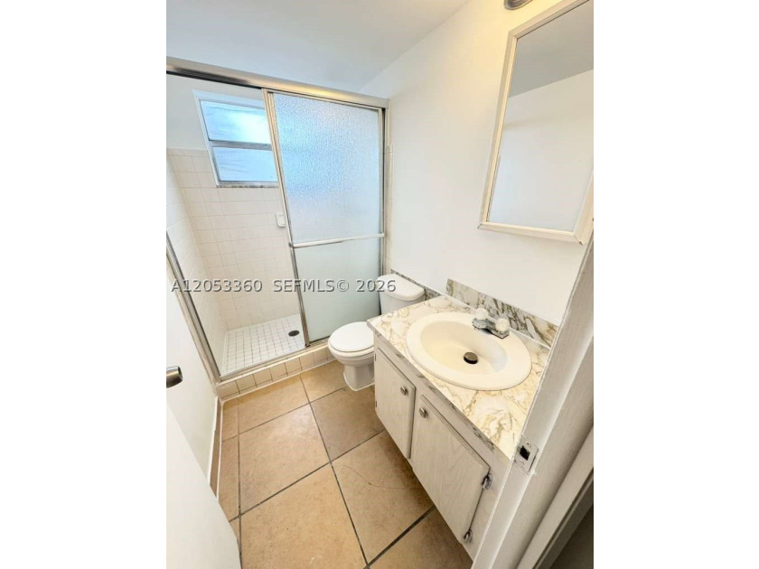 Very nice 2 bedroom/2 bathroom first floor corner unit tile - photo 18