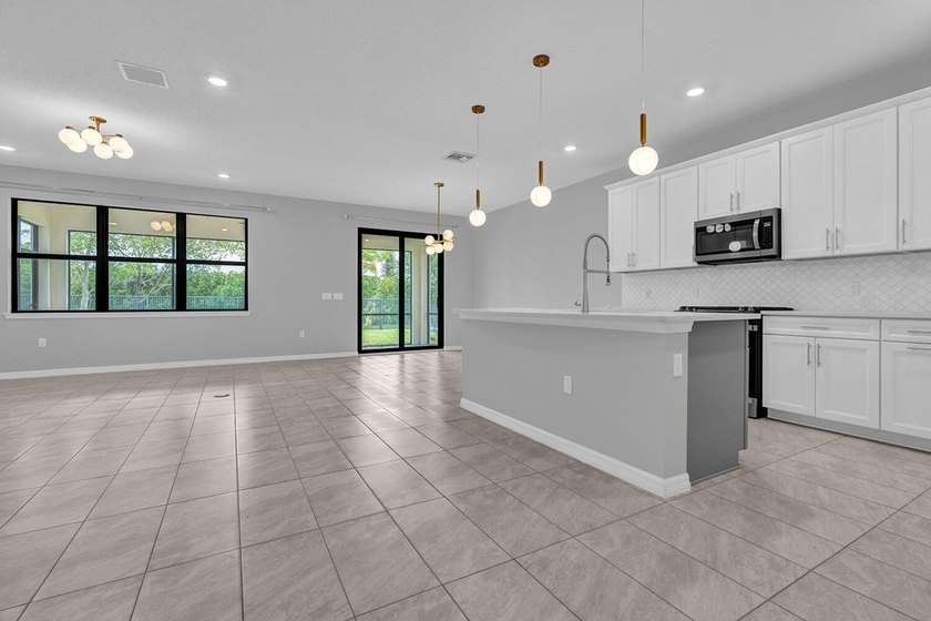 Welcome to this two-story residence located in Fields in Lake - photo 6