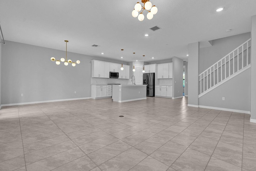 Welcome to this two-story residence located in Fields in Lake - photo 7