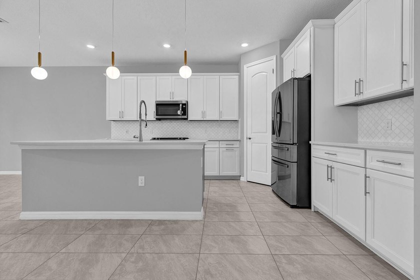 Welcome to this two-story residence located in Fields in Lake - photo 8