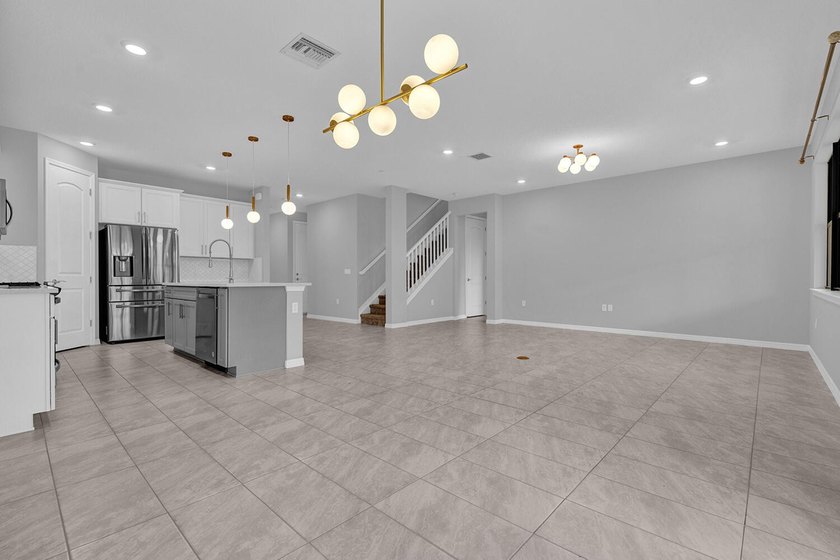 Welcome to this two-story residence located in Fields in Lake - photo 9