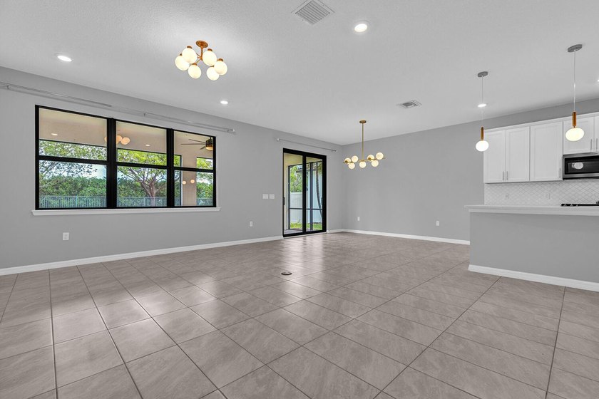 Welcome to this two-story residence located in Fields in Lake - photo 10