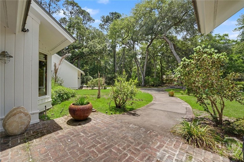 Set on a generous private lot at the end of a quiet street, this - photo 14