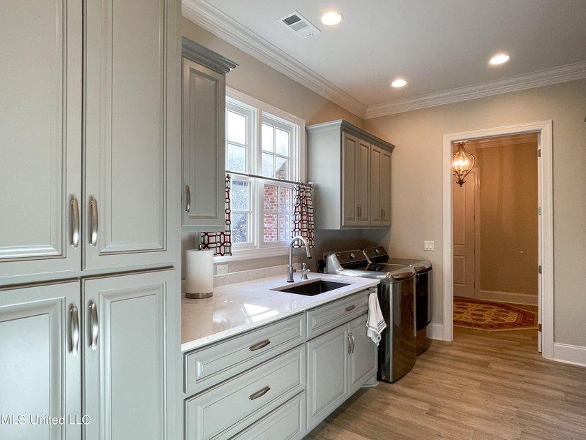 Discover this exceptional residence in The Highlands, a premier - photo 45