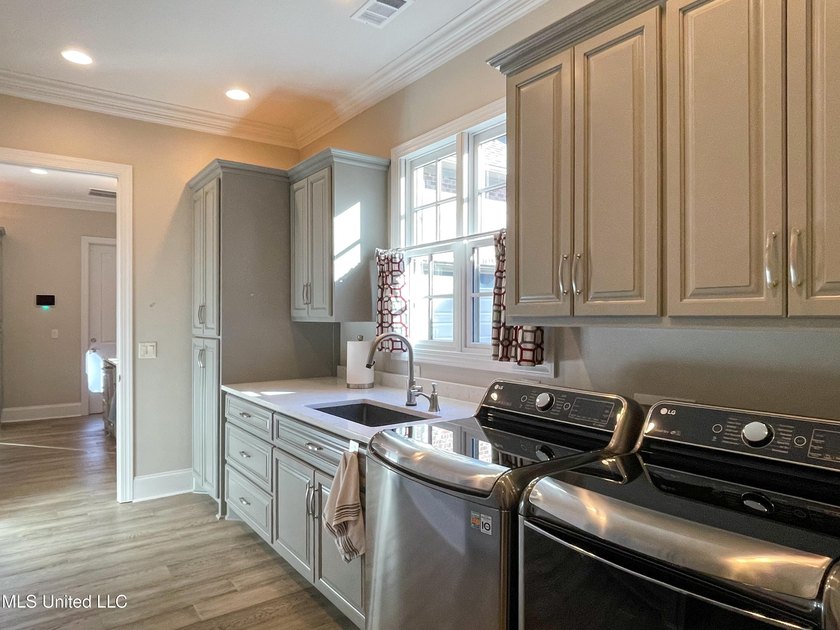 Discover this exceptional residence in The Highlands, a premier - photo 47